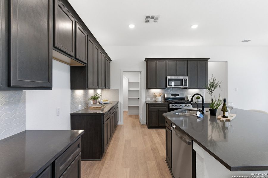 Furnished interior view inside a new home in The Crossvine, Schertz (Image 6).