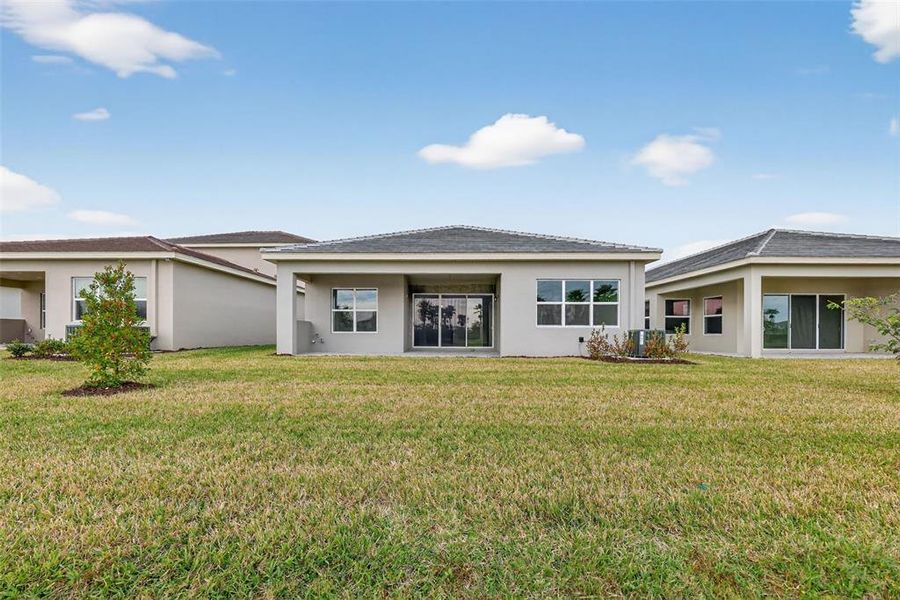 Exterior details and patio area of a home in Winding Ridge, Wesley Chapel (Image 25).