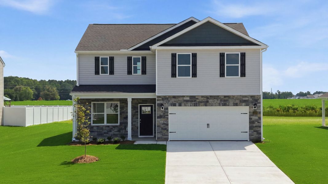 Front exterior of a new home in East Ridge, Ayden, NC, highlighting curb appeal (Image 19).