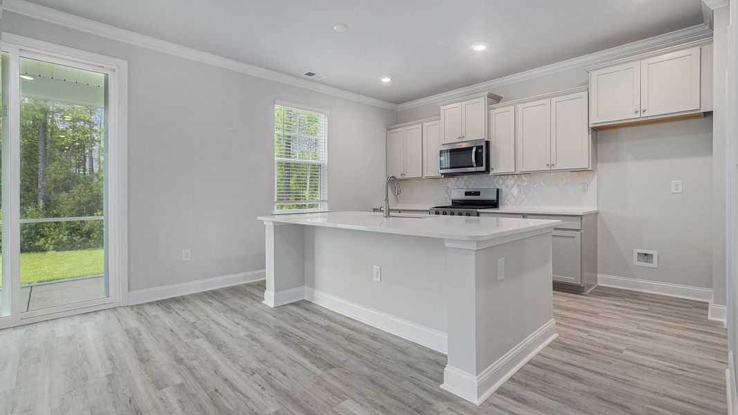 Representative furnished interior of a home built from the GLYNN by D.R. Horton in The Forest at Black Bear, Longs (Image 4).