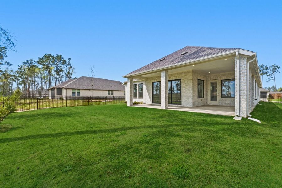 Exterior details and patio area of a home in The Highlands, Porter (Image 3).