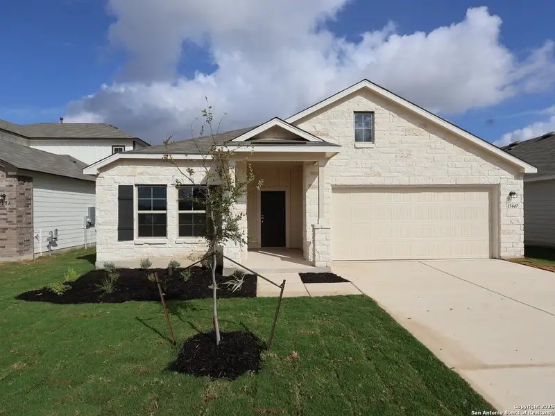 Exterior details and patio area of a home in Winding Brook, San Antonio (Image 16).