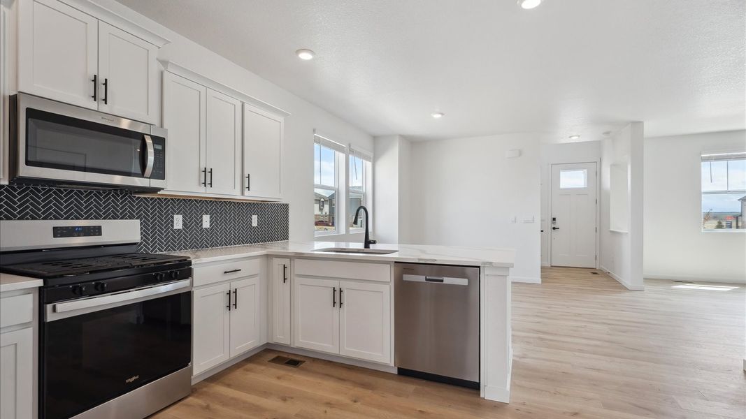 Furnished interior view inside a new home in Horizon Uptown, Aurora (Image 4).
