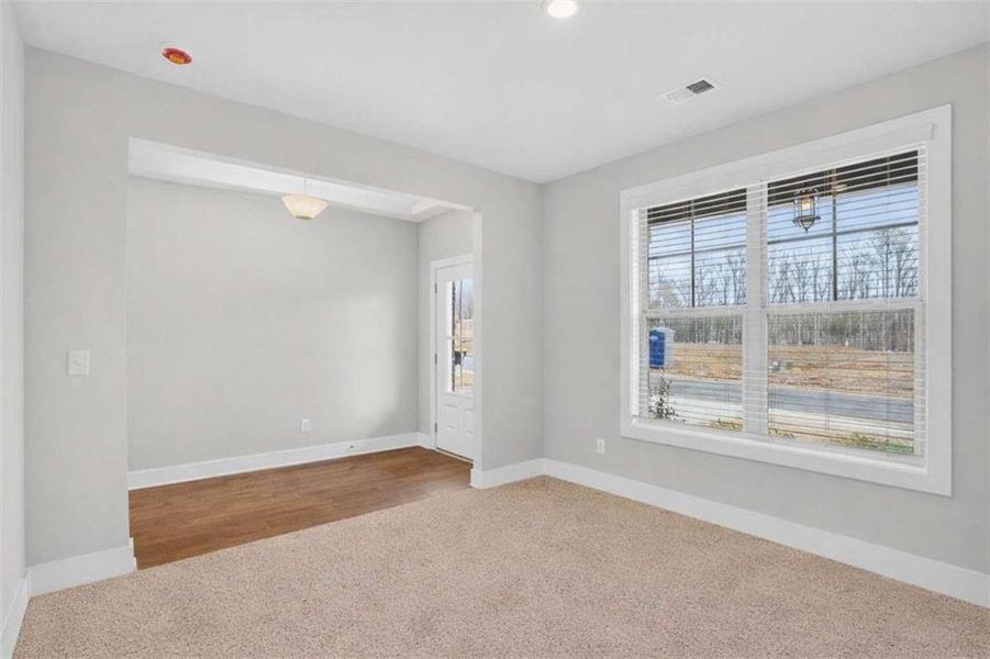 Spacious, unfurnished interior of a new home in The Fairways at Mirror Lake, Villa Rica (Image 11).