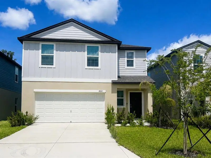 Front exterior of a new home in , Plant City, FL, highlighting curb appeal (Image 2). Front exterior of a new home in , Plant City, FL, highlighting curb appeal (Image 2).