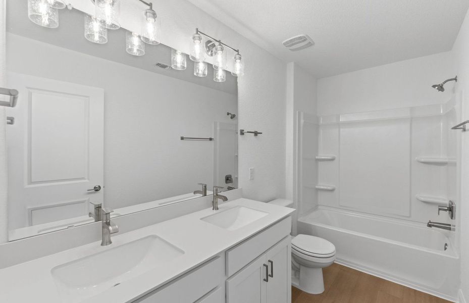 Furnished interior view inside a new home in Saddleback at Santa Rita Ranch, Liberty Hill (Image 5). Furnished interior view inside a new home in Saddleback at Santa Rita Ranch, Liberty Hill (Image 5).