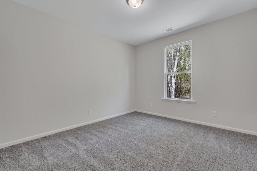 Spacious, unfurnished interior of a new home in McAllister Pointe, Richmond Hill (Image 24).