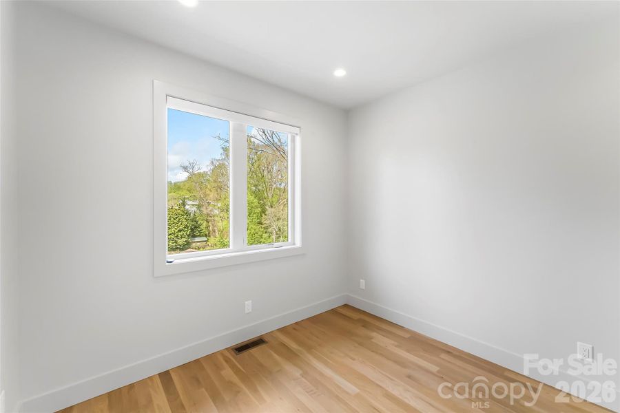 Spacious, unfurnished interior of a new home in , Asheville (Image 41).