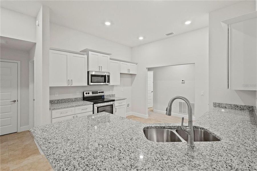 Stock photo. Home will be similar colors and material will vary.