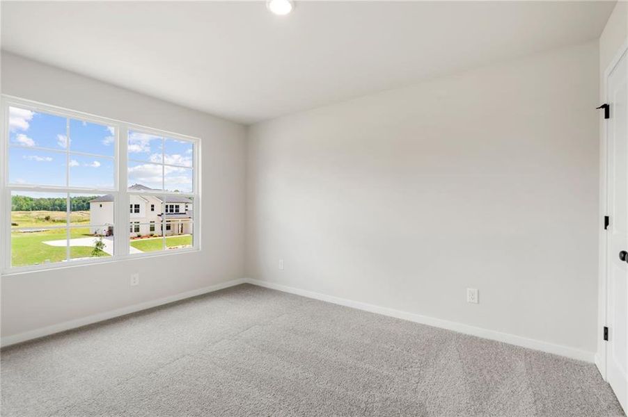 Spacious, unfurnished interior of a new home in Windsong Estates, McDonough (Image 24).