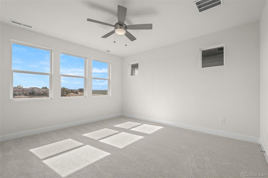 Spacious, unfurnished interior of a new home in Trailside at Cottonwood Creek, Colorado Springs (Image 18).