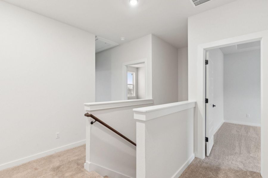 Furnished interior view inside a new home in Townhomes at Gattis, Round Rock (Image 19). Furnished interior view inside a new home in Townhomes at Gattis, Round Rock (Image 19).