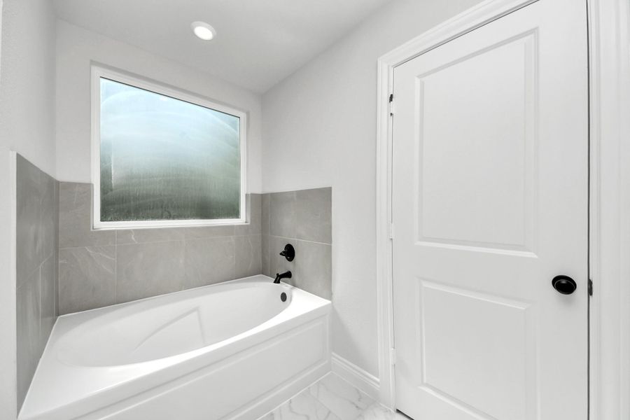 Furnished interior view inside a new home in Lexington Heights, Willis (Image 15).