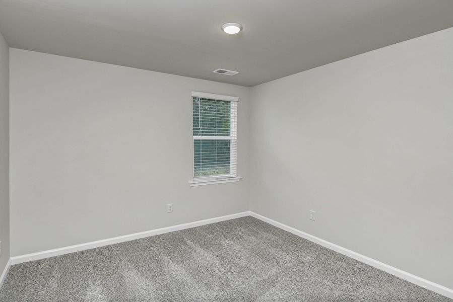 Representative unfurnished interior of a home built from the Harper by Veranda Homes in The Abbey at Trolley Run Station, Aiken (Image 27).