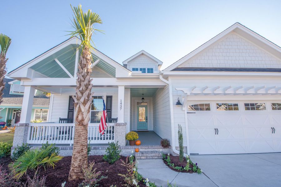 Representative exterior photo of a completed home built from the Kauai by Bill Clark Homes in Osprey Landing, Southport, NC (Image 28). Representative exterior photo of a completed home built from the Kauai by Bill Clark Homes in Osprey Landing, Southport, NC (Image 28).