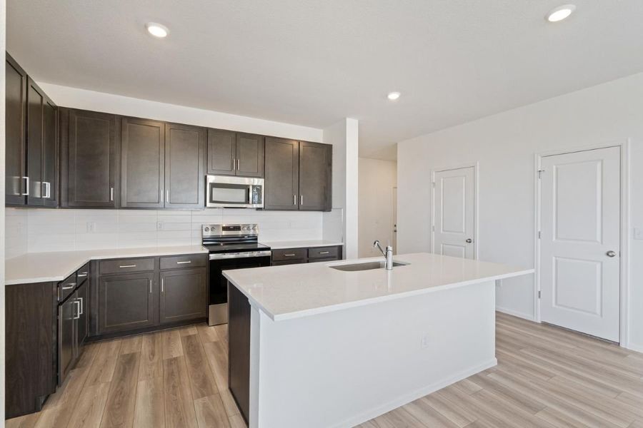 Furnished interior view inside a new home in Bennett Crossing Reserve, Bennett (Image 7).
