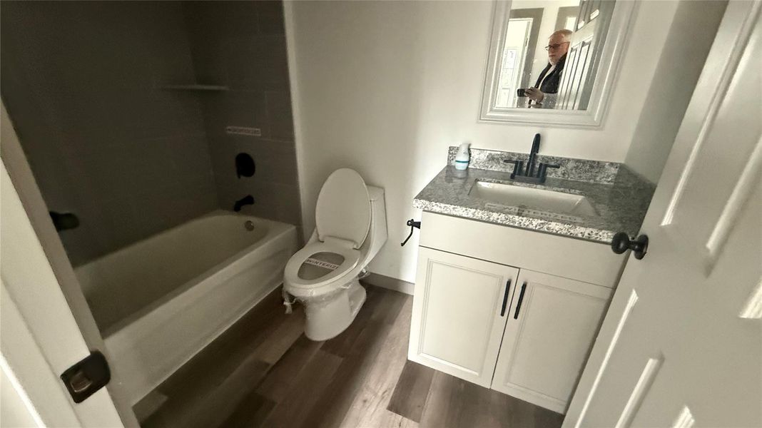 Furnished interior view inside a new home in , Conroe (Image 6).