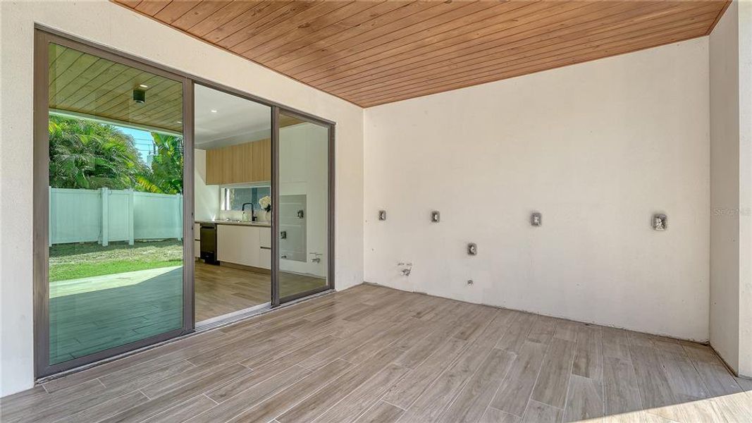 Exterior details and patio area of a home in , Sarasota (Image 23).