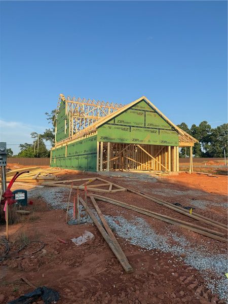 A new construction home with visible wood framing