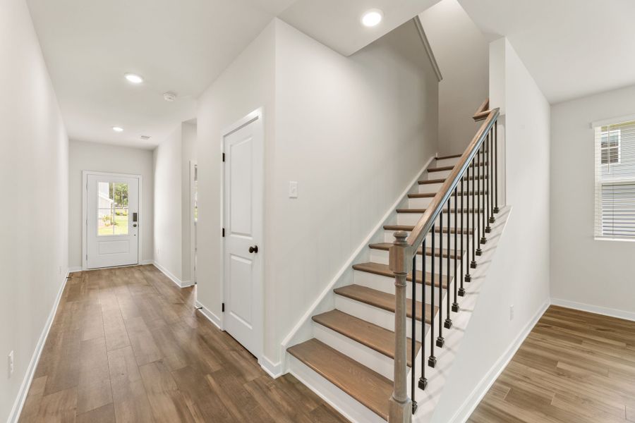 A staircase in a house. A staircase in a house.