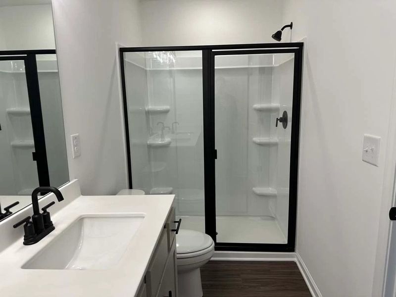 Primary Bathroom Walk-In Shower featuring Artisan Collection Finishes