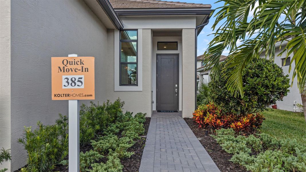 Exterior details and patio area of a home in Cresswind Palm Beach at Westlake, The Acreage (Image 21). Exterior details and patio area of a home in Cresswind Palm Beach at Westlake, The Acreage (Image 21).
