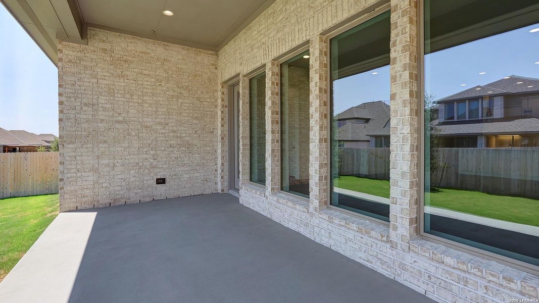 Exterior details and patio area of a home in Kallison Ranch, San Antonio (Image 24).
