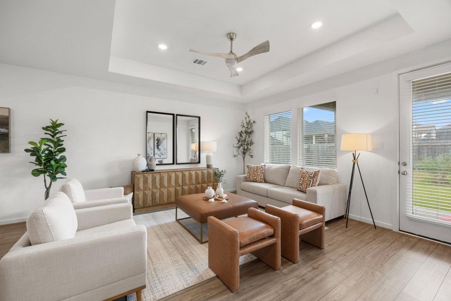 Furnished interior view inside a new home in Morgan's Landing 50s, La Porte (Image 5).