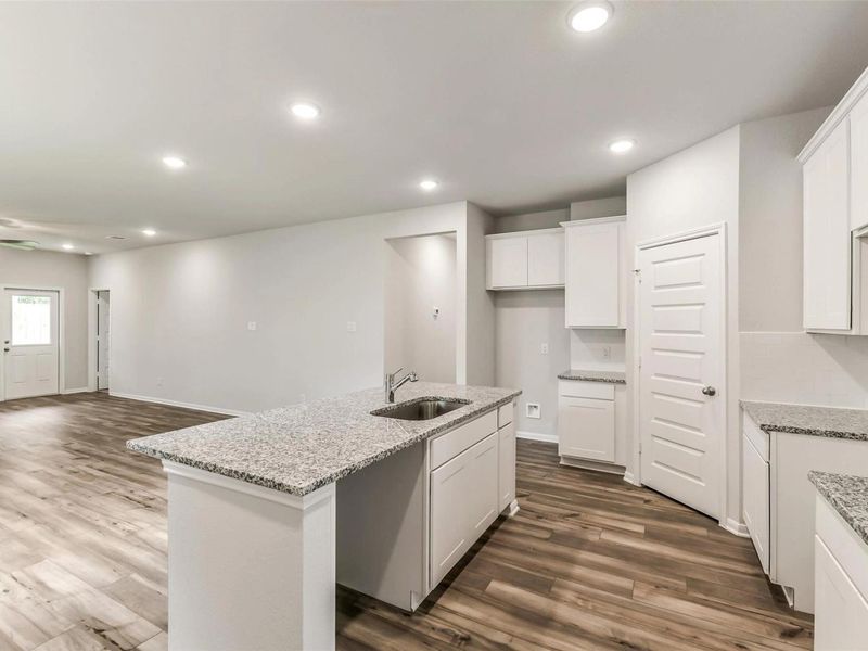 Furnished interior view inside a new home in Caney Creek Place, Conroe (Image 7).