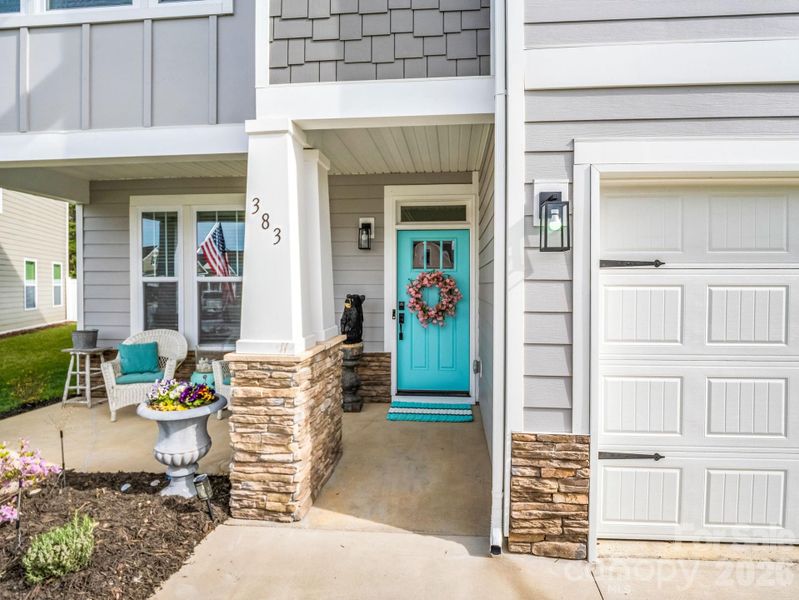 Welcome family and friends on the covered front porch.