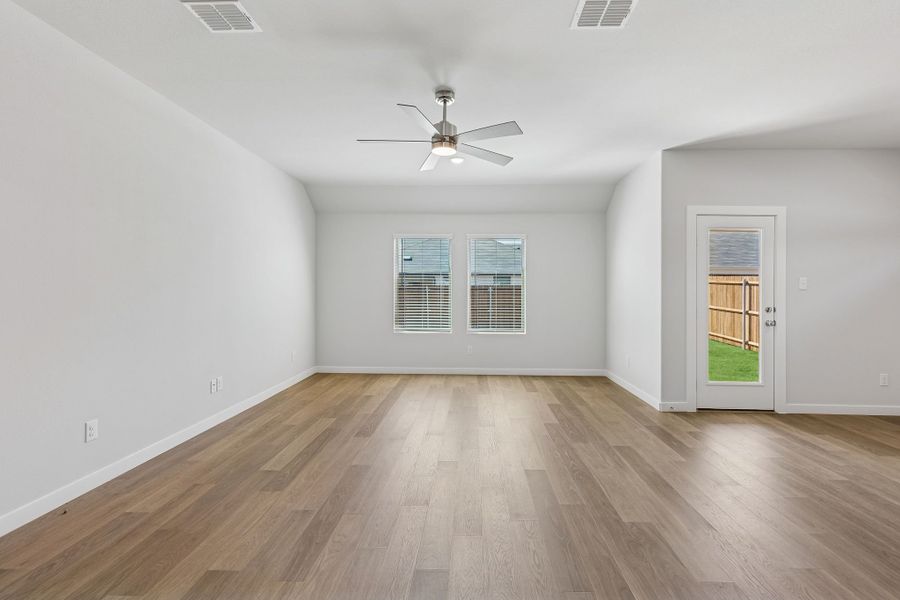 Living Room in the Harrison home plan by Trophy Signature Homes – REPRESENTATIVE PHOTO
