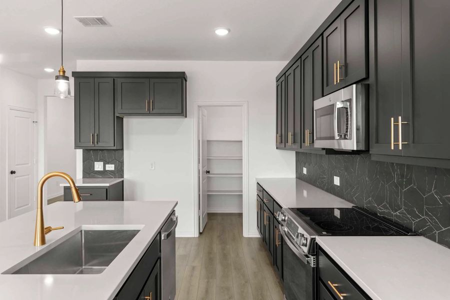 Kitchen featuring the Noir Collection