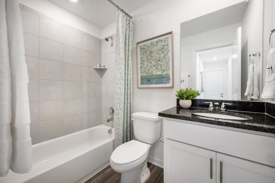 Representative furnished interior of a home built from the Hawk by Taylor Morrison in Longview 40s, Del Valle (Image 16).