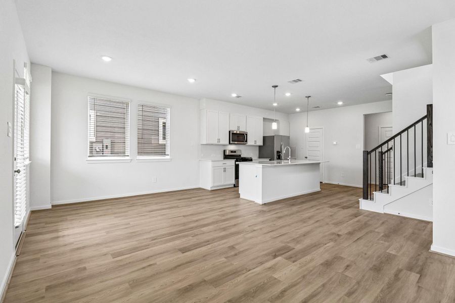 Photos are not of the actual home, but are photos of the builder home with same floorplan with similar interior finishes.