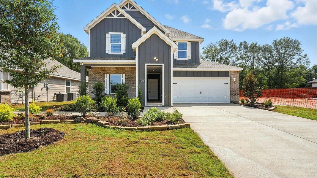 Representative exterior photo of a completed home built from the Naples by D.R. Horton in The Reserve at Timber Creek, Lindale, TX (Image 2).