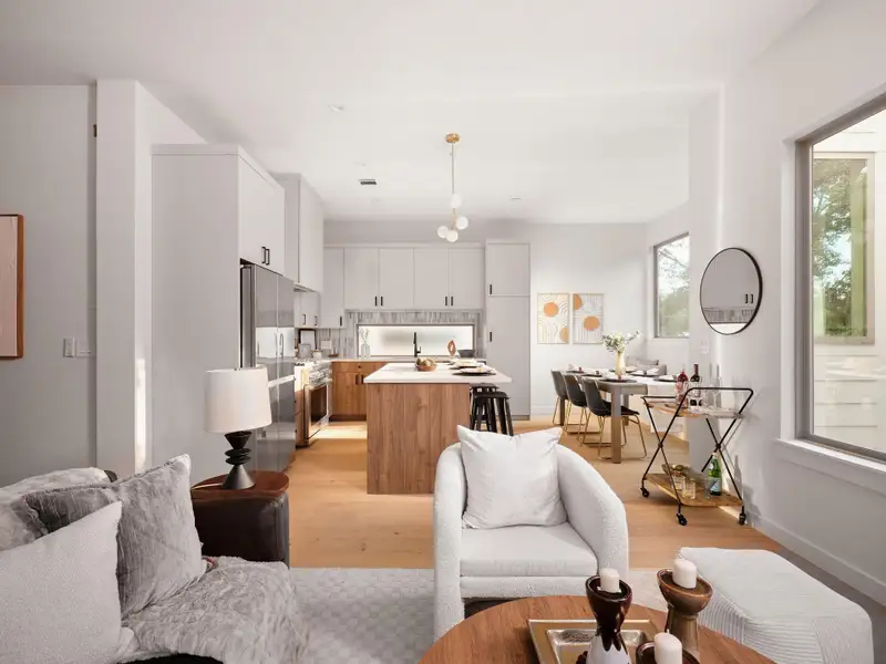 Living area featuring light wood-type flooring and baseboards