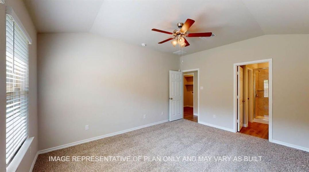 Unfurnished bedroom with vaulted ceiling, carpet floors, ensuite bathroom, baseboards, and ceiling fan Unfurnished bedroom with vaulted ceiling, carpet floors, ensuite bathroom, baseboards, and ceiling fan