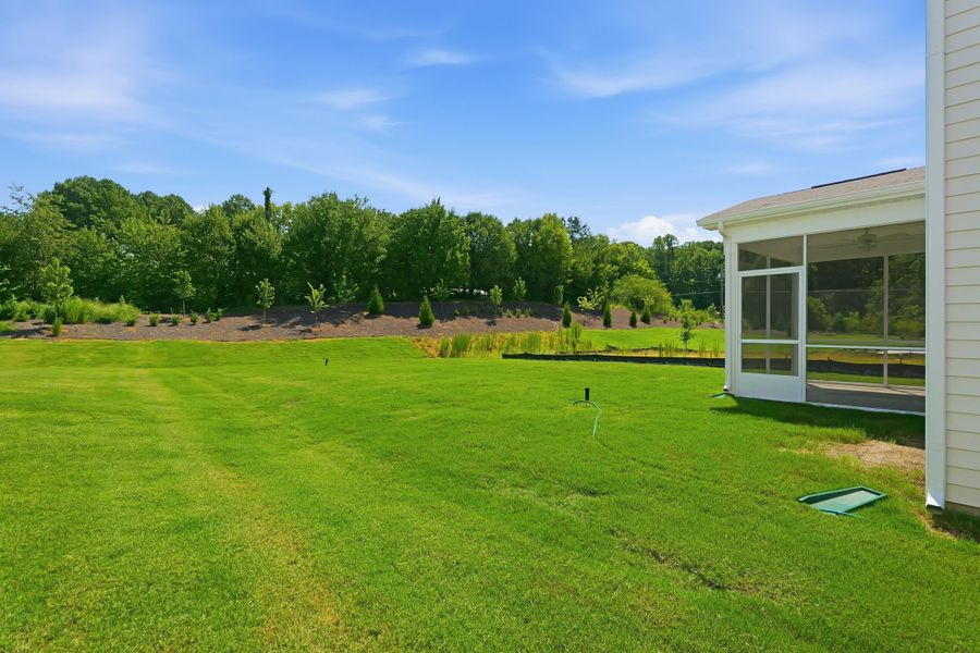Exterior details and patio area of a home in Piper Creek, Newton (Image 27).