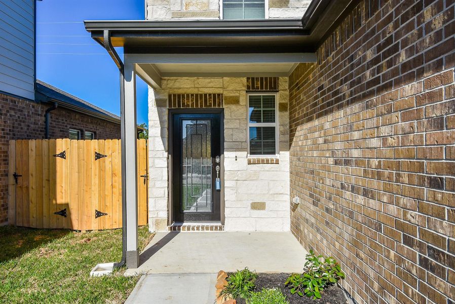 A sun dappled, recessed covered front entrance adds privacy, shelter from spring storms and lots of welcoming wishes! A sun dappled, recessed covered front entrance adds privacy, shelter from spring storms and lots of welcoming wishes!