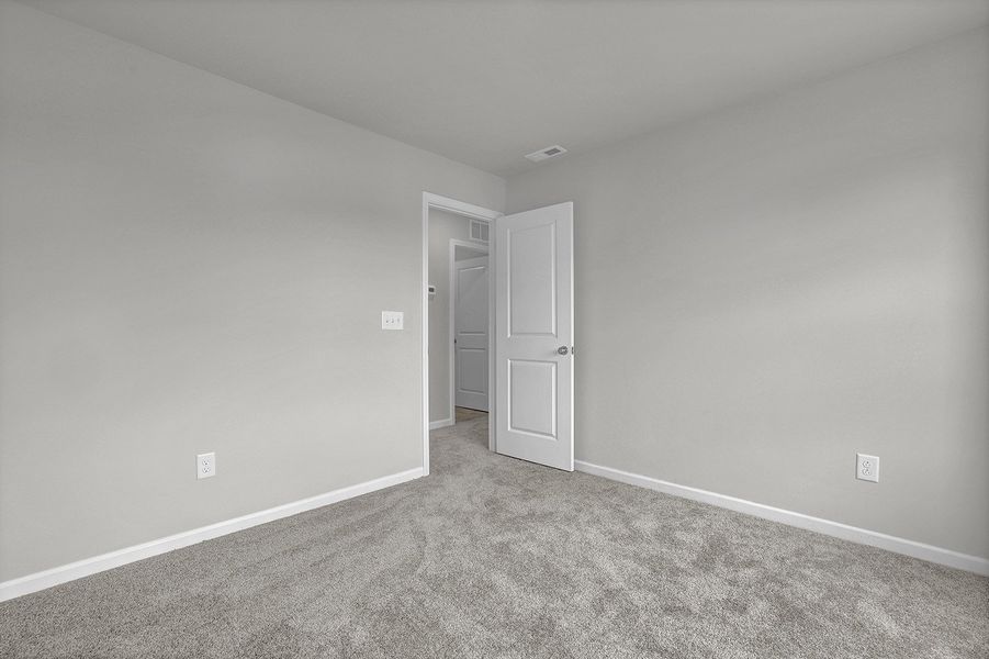 Spacious, unfurnished interior of a new home in River Tide Farms, Bolivia (Image 24).