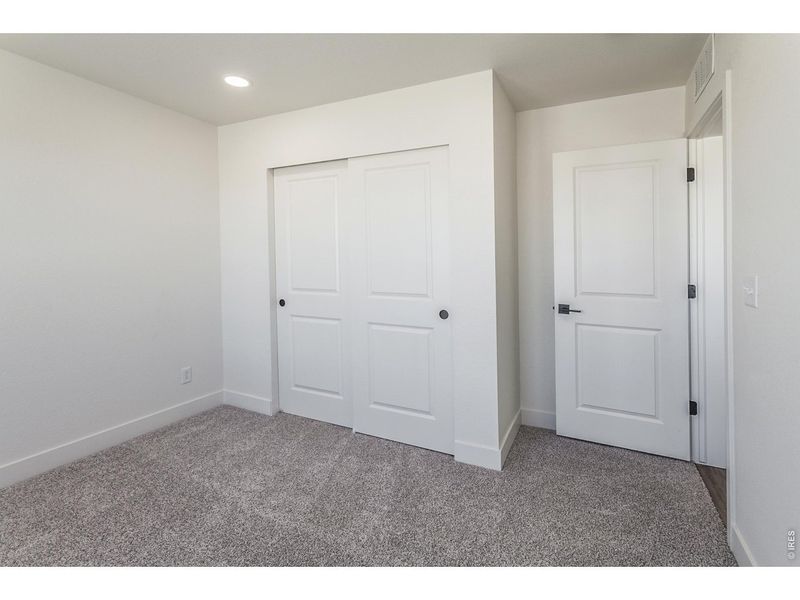 Spacious, unfurnished interior of a new home in Prairie Song Story Collection - Single Family Homes, Windsor (Image 30).