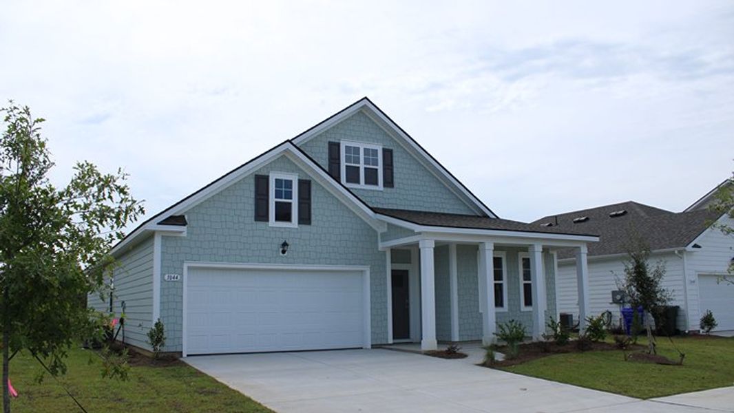 Representative exterior photo of a completed home built from the Plan by D.R. Horton in Hemingway Landing, Conway, SC (Image 12). Representative exterior photo of a completed home built from the Plan by D.R. Horton in Hemingway Landing, Conway, SC (Image 12).