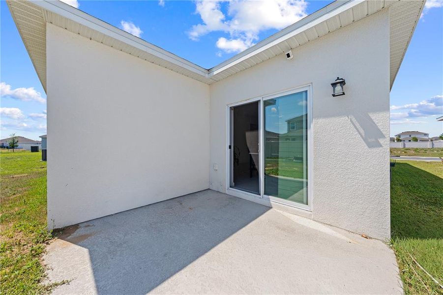 Exterior details and patio area of a home in Cypress Park Estates, Haines City (Image 3).