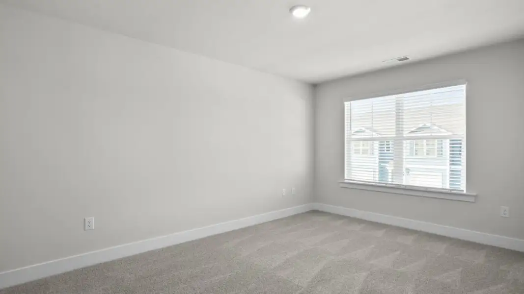 Spacious, unfurnished interior of a new home in The Townes at Cedar Hill Landing, Navassa (Image 19).