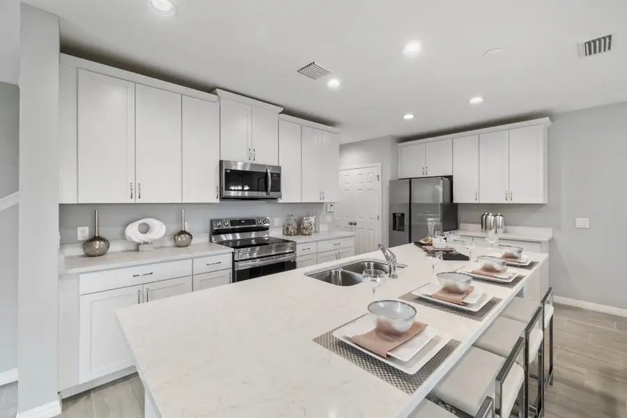 Furnished interior view inside a new home in Sky Lakes Towns, St. Cloud (Image 1).