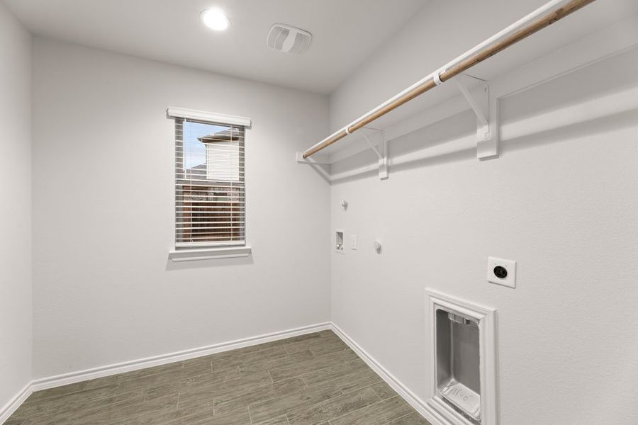 Representative exterior photo of a completed home built from the Austin by Impression Homes in DeBerry Reserve, Royse City, TX (Image 24). Representative exterior photo of a completed home built from the Austin by Impression Homes in DeBerry Reserve, Royse City, TX (Image 24).