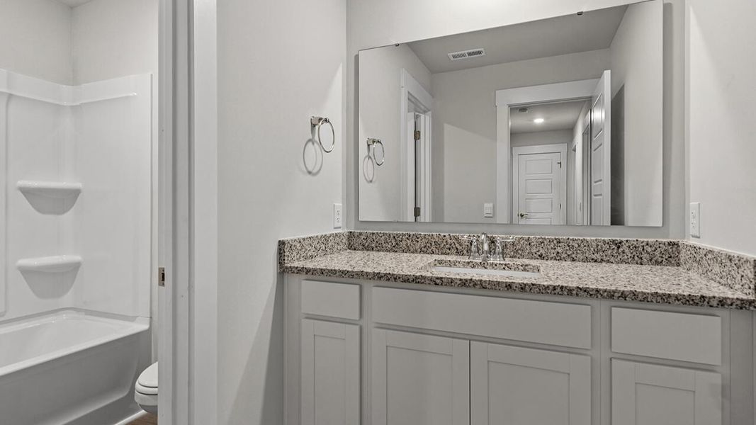 Furnished interior view inside a new home in Vineyard Trail, Jacksonville (Image 11).