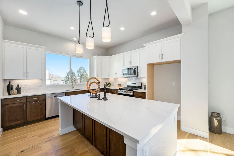 Interior:Chef's kitchen with tons of storage and large window over the sink Interior:Chef's kitchen with tons of storage and large window over the sink