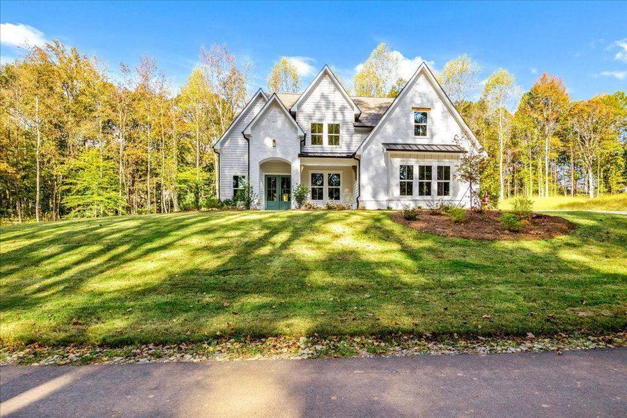 Front exterior of a new home in , Gainesville, GA, highlighting curb appeal (Image 22).