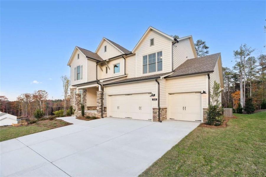 Front exterior of a new home in Ellis, Marietta, GA, highlighting curb appeal (Image 1).